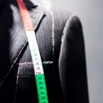 custom 3 piece suit being measured