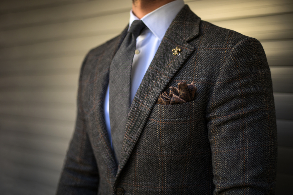 Detail of man in custom suit