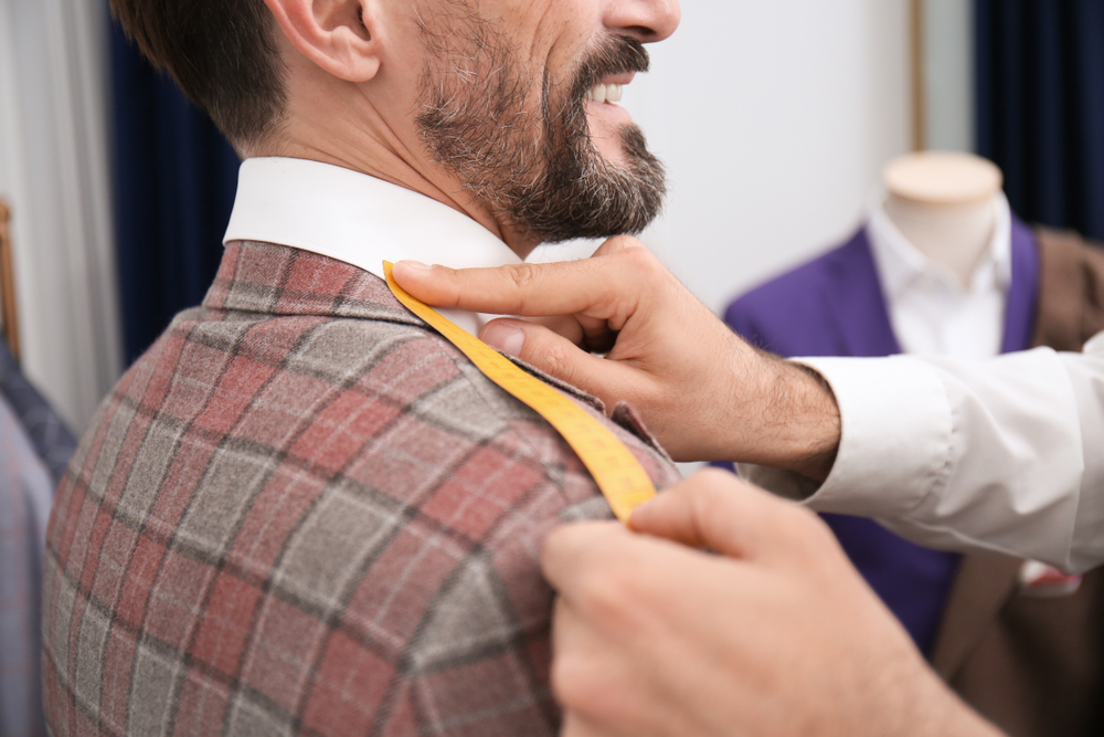 Man choosing a custom suit.